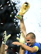 FABIO CANNAVARO.... WE ARE THE FOOTBALL SOCCER WORLD CHAMPIONS... For only the second time in World Cup history, the final was settled on a penalty shootout. Fabio Grosso, the goal hero in the semifinal against Germany, scored the winning penalty for four-time champions Italy... Materazzi had been busy at both ends of the field. The Italian defender conceded a penalty and scored a goal in the first half to even the match against France at 1-1 in the World Cup final